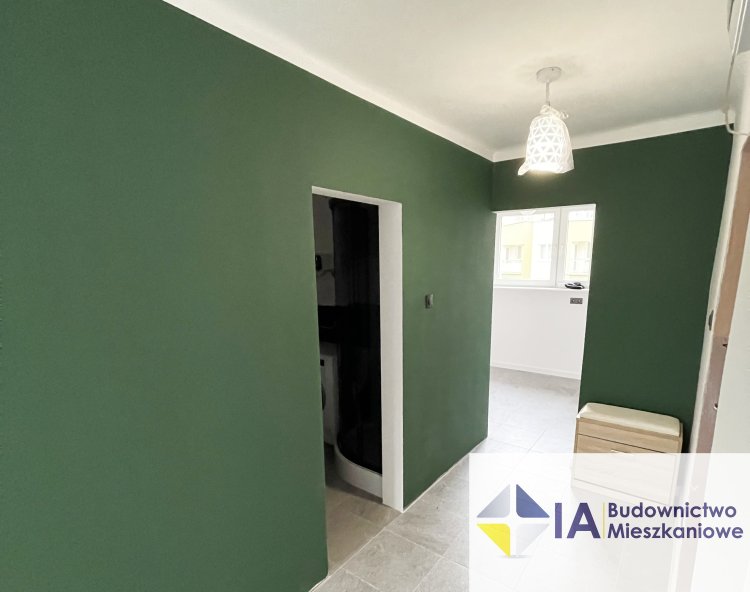 Mieszkanie pomalowane na butelkową zieleń